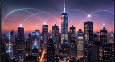 City skyline at night with digital data connections